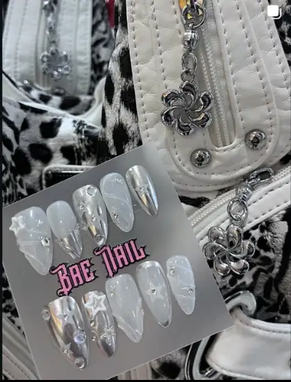 Nail case styled with silver handbags