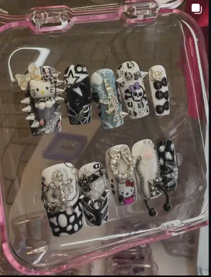 Black and metallic nail collection in a case